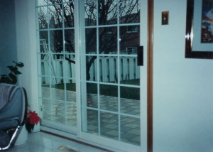 white sliding patio glass doors
