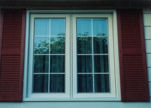windows with white trim with covers